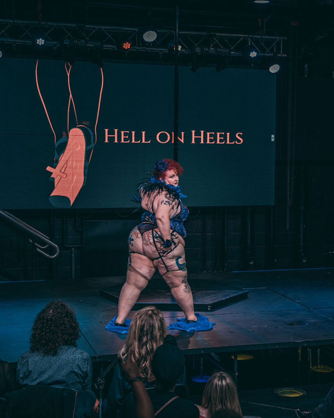 Performer on pole during Hell on Heels